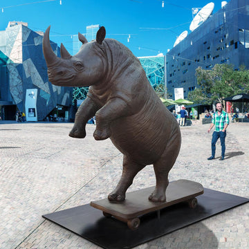 The Northern White Rhino Races on the Skateboard (Bronze Sculpture)