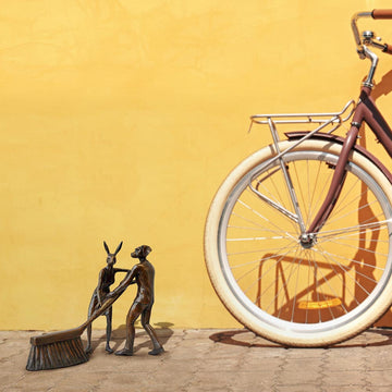 A Little Tidy Up (Bronze Sculpture)