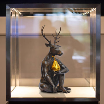 He thought about buying a new tie but he bought a gold pear instead (Bronze Sculpture)