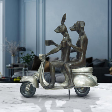 Their Morning Ride Started with Cappuccino and a Kiss (Bronze Sculpture)