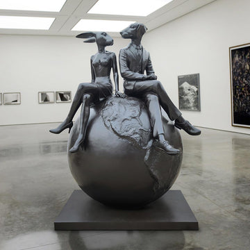Rabbitwoman and Dogman on top of the big world (Bronze Sculpture)