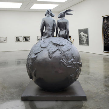 Rabbitwoman and Dogman on top of the big world (Bronze Sculpture)