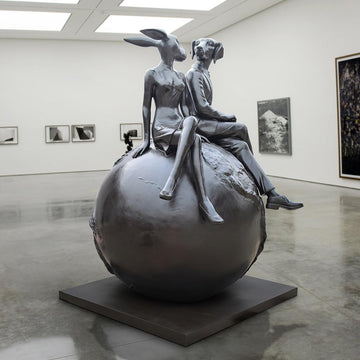 Rabbitwoman and Dogman on top of the big world (Bronze Sculpture)