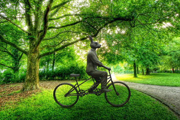 He hopped on two wheels and saw the world (Bronze Sculpture)