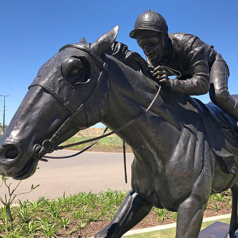 Jockey Riding Horse Life Size Statue in Bronze