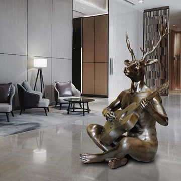 He Played His Own Songs Plus a Few Beatles Hits (Bronze Sculpture)