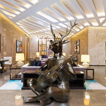 He Played His Own Songs Plus a Few Beatles Hits (Bronze Sculpture)