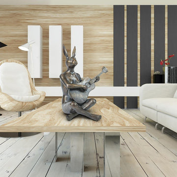 She Played the Songs That Made Her Happy (Bronze Sculpture)