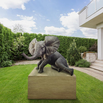 Relaxing Babar the Elephant (Bronze Sculpture, Mid-Size)