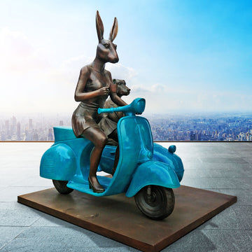 Together Side by Side on Blue Wheels (Bronze Sculpture)