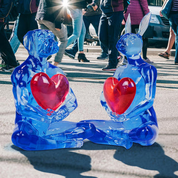 He gave his heart to his one love (blue resin dog holding red heart)