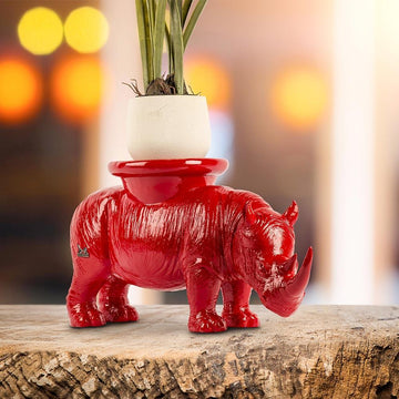 He carried love on his back wherever he went (Candle/Plant Holder Resin Sculpture)