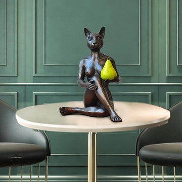 Catwoman Thought a Pear in the Hand Is Worth Two in the Bush (Bronze Sculpture)