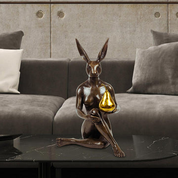 Rabbitwoman Thought a Pear in the Hand Is Worth Two in the Bush (Bronze Sculpture)