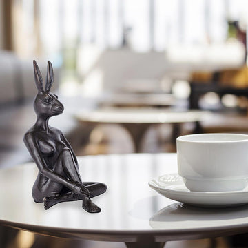 Rabbitwoman thinks big (Bronze Sculpture, Pocket Size)