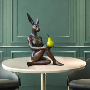 Rabbitwoman Thought a Pear in the Hand Is Worth Two in the Bush (Bronze Sculpture)