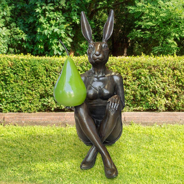 She Thought a Pear a Day Would Help Her Play (Bronze Sculpture)