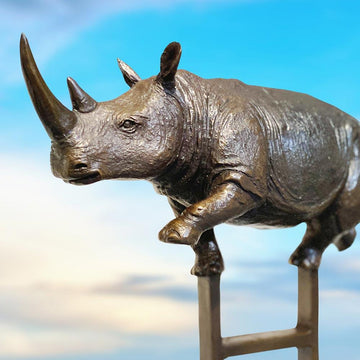 Rhino Reaches New Heights Above It All (Bronze Sculpture)