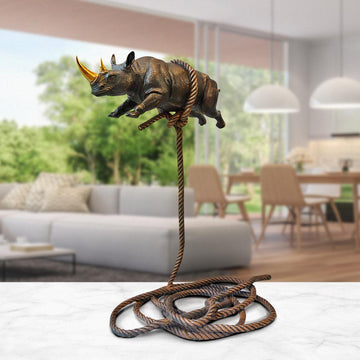 Flying Rhino on Short Rope with a Gold Horn (Bronze Sculpture)
