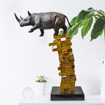 If Rhinos Get Knocked Down They Will Get Back Up Again (Bronze Sculpture)