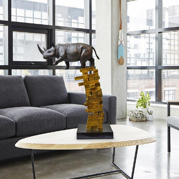 If Rhinos Get Knocked Down They Will Get Back Up Again (Bronze Sculpture)