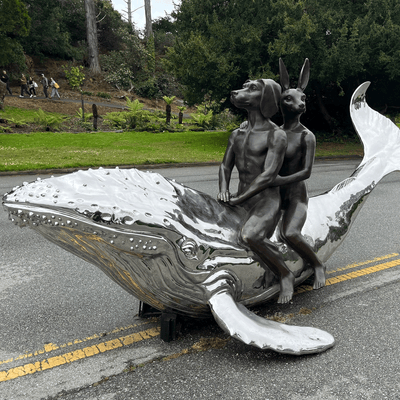 Rabbitwoman and Dogman, statue lobbyists for wildlife conservation