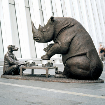 The White Rhino Was Thinking Ahead with Dogman's Encouragement (Bronze Sculpture)
