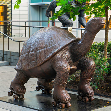 The Galapagos Tortoise Races on Roller Skates (Bronze Sculpture)