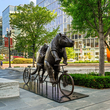 The Hippo and Red Wolf Race on the Bicycle (Bronze Sculpture)