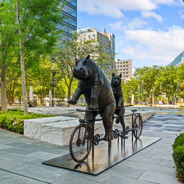 The Hippo and Red Wolf Race on the Bicycle (Bronze Sculpture)