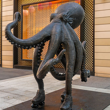 The Octopus Races on Rollers Skates (Bronze Sculpture)