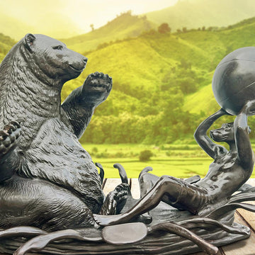 The Polar Bear with Dogman Stayed Cool (Bronze Sculpture)
