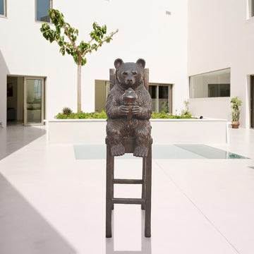 Bear Above It All, Delighting in a Sweet Treat (Bronze Sculpture, Mid-Size)