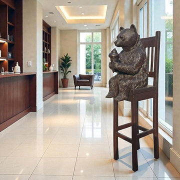 Bear Above It All, Delighting in a Sweet Treat (Bronze Sculpture, Mid-Size)