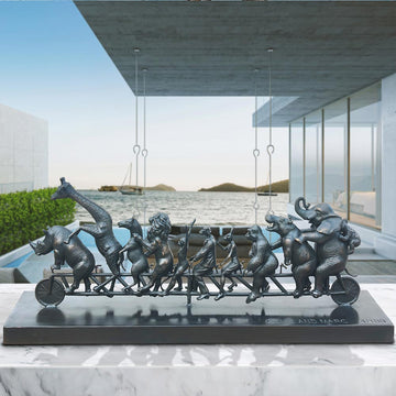 Dogman with Rabbitwoman on a the Biggest Ride of All (Bronze Sculpture)