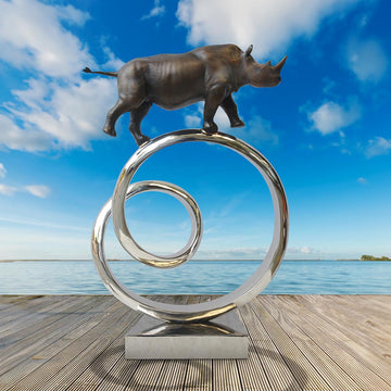 Black Rhino Goes Round A Big World (Bronze Sculpture)