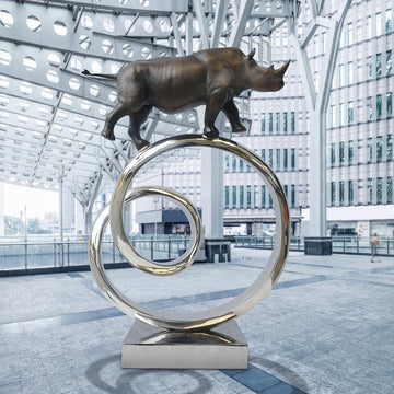 Black Rhino Goes Round A Big World (Bronze Sculpture)