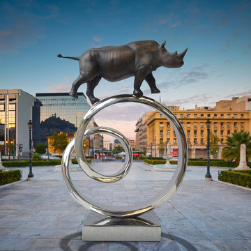 Black Rhino Goes Round A Big World (Bronze Sculpture)
