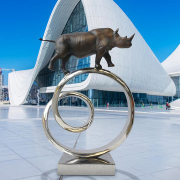 Black Rhino Goes Round A Big World (Bronze Sculpture)