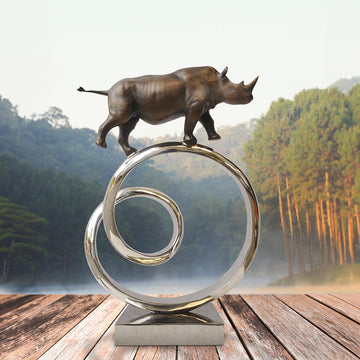Black Rhino Goes Round A Big World (Bronze Sculpture)