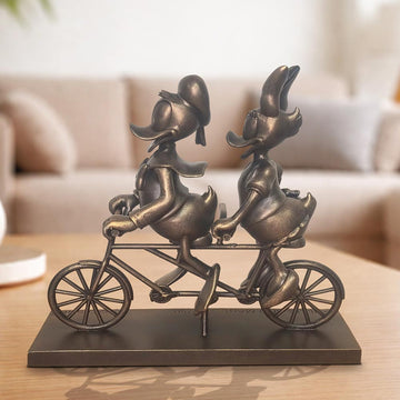 Daisy and Donald Take Love for a Spin (Resin Sculpture)