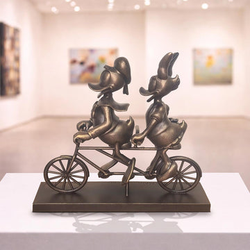 Daisy and Donald Take Love for a Spin (Resin Sculpture)