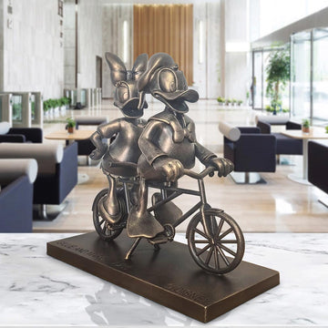 Daisy and Donald Take Love for a Spin (Resin Sculpture)