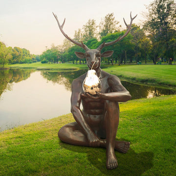 Deerman Loves His Pear (Bronze Sculpture)