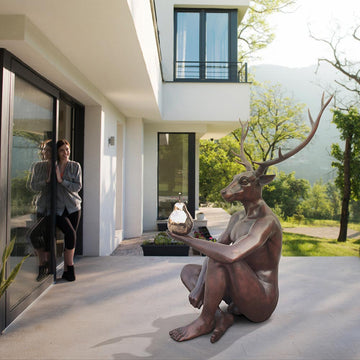 Deerman Loves His Pear (Bronze Sculpture)