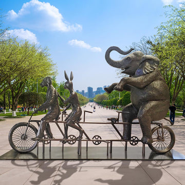 The African Elephant Was on a Wild Ride to a Safer Place with Rabbitwoman and Dogman (Bronze Sculpture)
