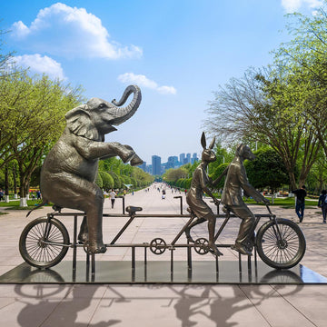The African Elephant Was on a Wild Ride to a Safer Place with Rabbitwoman and Dogman (Bronze Sculpture)