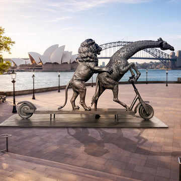 The Masai Giraffe and Lion Race on the Scooter (Bronze Sculpture)