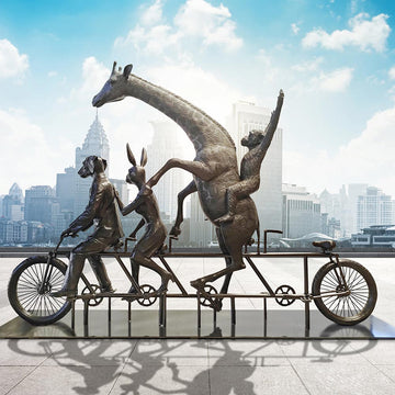 The Giraffe and Chimpanzee Were on a Wild Ride to a Safer Place with Rabbitwoman and Dogman (Bronze Sculpture)