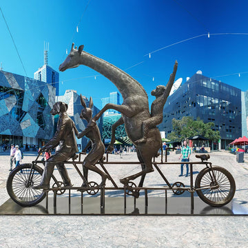 The Giraffe and Chimpanzee Were on a Wild Ride to a Safer Place with Rabbitwoman and Dogman (Bronze Sculpture)